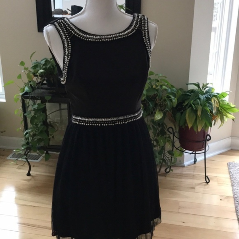 Love Reign black beaded cocktail dress.